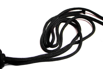 abstract shape on white background. abstract line background. Black rope isolated on white. close up black of rope isolated on white background. Saving clipping paths knot twisted