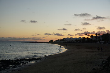 beach, sand, rocks, volcanic island, atlantic ocean, coastline, shore, sunset, lanzarote, matagorda, puerto del carmen, November 2025
