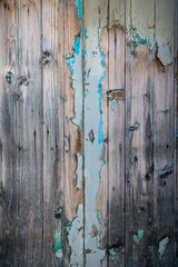 Rustic old wooden wall with peeling paint background