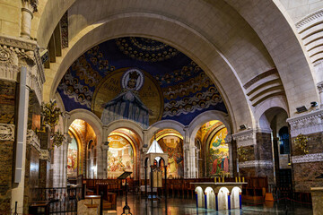 Interior of the Basilica in the Sanctuary of Lourdes, France. Mayor pilgrimage spot for Catholics
