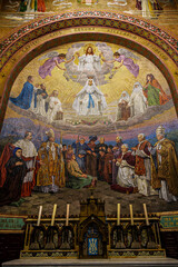 Naklejka premium Interior of the Basilica in the Sanctuary of Lourdes, France. Mayor pilgrimage spot for Catholics
