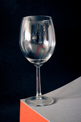 Empty wine glass on minimalist background
