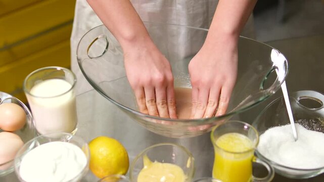Cook Mixes Flour With Eggs For Pancake. Preparing Breakfast In Home Kitchen. Kneading Dough With Whisk For Baking Cake. Chef Cook Dessert Mixing Dough. Pancake Culinary. Whisk Mixing Dough.