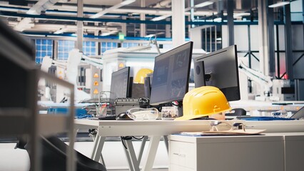 Computer software in photovoltaics factory used for optimizing production flow. PC program in empty sustainable energy solar panels plant used for monitoring manufacturing process.