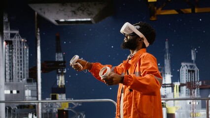 African american engineer on offshore platform wears virtual reality gear to oversee oil and gas drilling simulation, using augmented technology for advanced industrial maintenance.