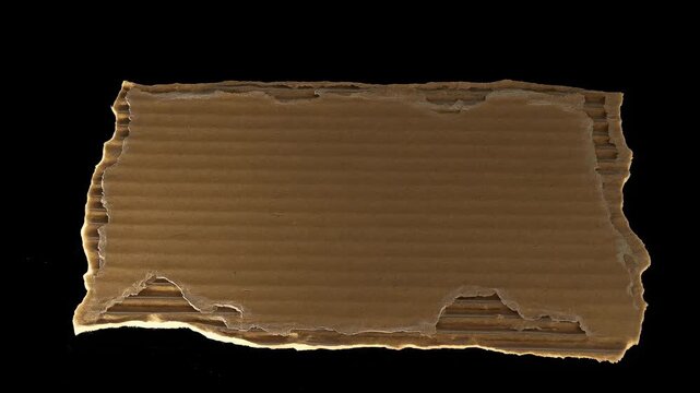 A piece of textured cardboard with a torn edge and a logo overlay.