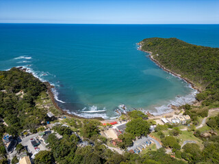 Aerial view of Retiro dos Padres beach with sand, rocks and forest