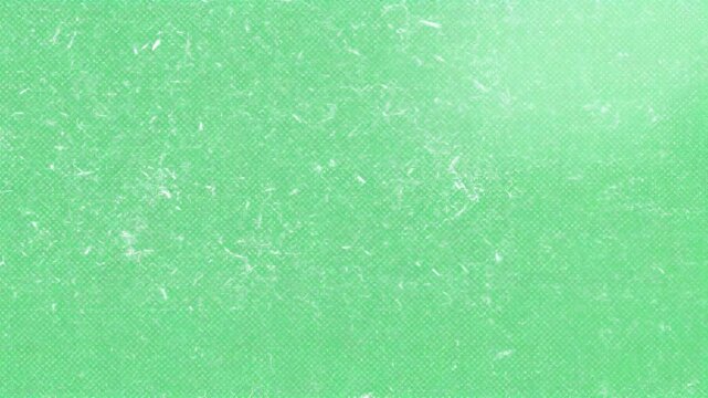 A textured green background with subtle patterns creating a soft, abstract feel.