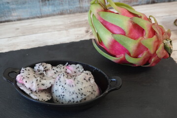Pitaya fresh fruit and its peeled pulp