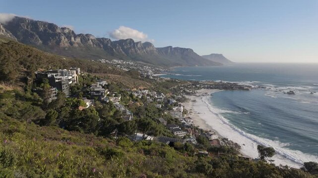 View of the Atlantic Seaboard from The Rock view site at Bantry Bay showing Clifton Beach, Camps Bay and the 12 Apostles. Cape Town. Western Cape. South Africa. 30fps footage captured in 4k 60p.