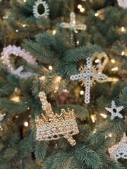 Close up of Chrismon ornaments on a holiday tree