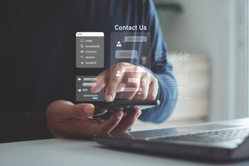 A person using a smartphone and laptop with digital chat and contact us icons, online communication, customer support, virtual assistance and modern technology solutions for business interaction.