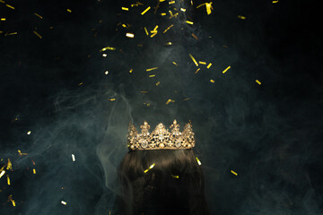 Gold Crown Diamond on hair wig model head. Sparking glitter diamond crown ready to put on winner...