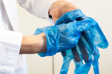 Medical Professional Practicing Safe Glove Removal to Prevent Cross-Contamination.