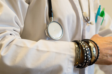 Close View of Healthcare Worker with Rings and Gold Bracelet, Poor Hand Hygiene and Jewelry Protocol