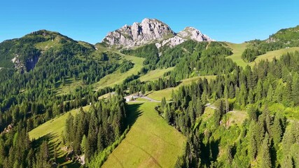 Drone Austria 4k. Nassfeld Pass on border of Austria and Italy. between the Austrian Gail Valley and the Italian Canal Valley.  popular summer travel tourism destination for hiking and road trip in Eu