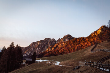 Rosengarten Dolomites glowing in warm winter sunset light