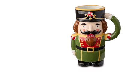 Earthenware Christmas Nutcracker mug on copy-space background.