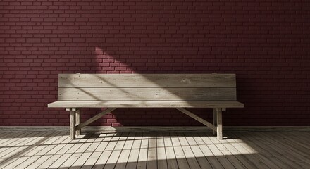 Rustic wooden bench stands against a textured dark red brick wall in a sunlit interior space