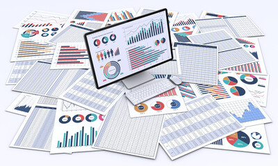 ビジネス資料とデータを表示したデスクトップパソコン