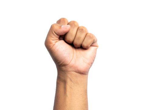 A closed tan-skinned fist extends upward against a black backdrop, symbolizing strength or resistance