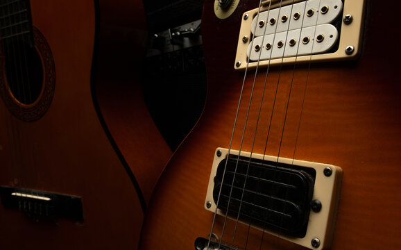 Two guitars macro for background with texture