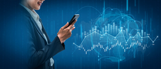 A business professional engages with digital data trends through a smartphone, showcasing modern finance analytics and data visualization in a professional setting. Scalp