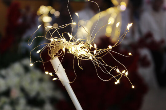 Close up of glowing fairy lights creating a festive atmosphere.
