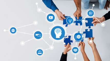 A group of diverse hands assembling blue puzzle pieces, symbolizing teamwork in artificial intelligence, creativity, and innovative solutions in a digital environment. Amity