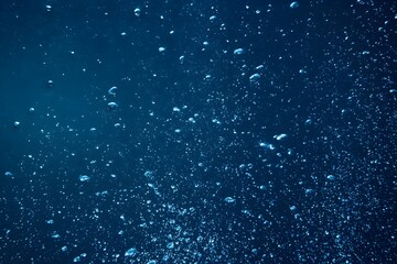 Underwater Air Bubbles Rising in Deep Blue Water &ndash; Fluid Motion Background