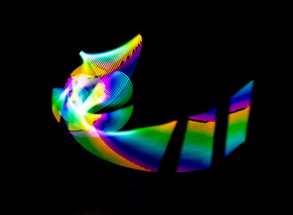 Abstract colorful light streaks and curved lines lightpainting . Abstract light art.