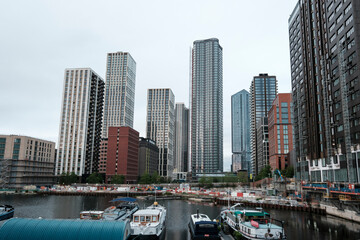 London canary wharf cityscape with modern buildings and boats