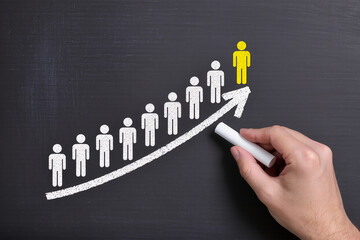 Finding solution of business relationship, Successful business team concept and Businessmen drawing puzzle pieces on chalkboard