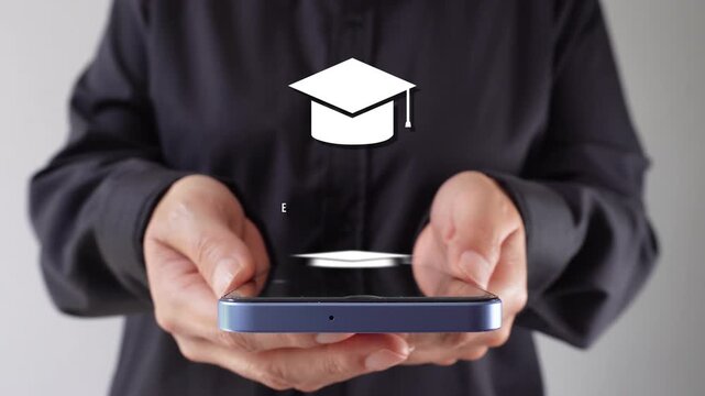 Businesswoman holding a smartphone with an animated graduation cap and the word "Education"