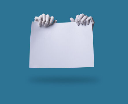 Robot Hands Holding a Blank Paper: Ad Space for Text or Data in the Digital World