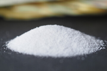 sugar substitutes sweetener powder on black background 