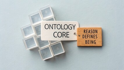 Conceptual representation of ontology core with tags signifying reason and existence on a light blue background