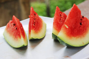 Red juicy watermelon pieces ready to be served.
