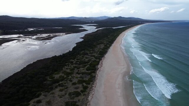 Henderson Lagoon And Steels Beach In Tasmania, Australia - Aerial Pullback