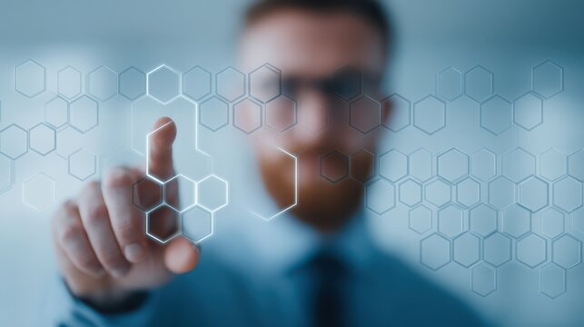 A man interacts with a digital interface, using a hexagonal design, suggesting advanced technology and data management.