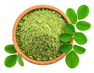 Green powder in wooden bowl, leaves on sides