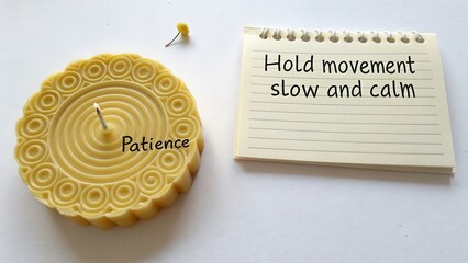 Yellow candle with message note encouraging patience and calmness in meditation or relaxation techniques for stress relief