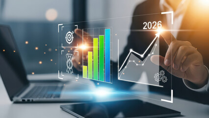 Business professional analyzing financial growth charts and data projections