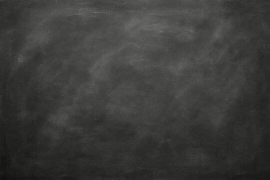 Blank chalkboard texture and background with subtle chalk dust. Empty blackboard surface for writing and educational concepts. Dark gray school board background with horizontal orientation.
