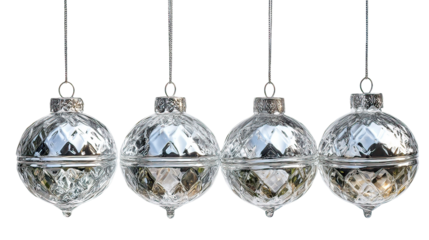 Four silver glass ornaments hanging with crystal shine and reflective surface on transparent background