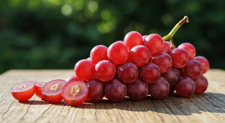 Sweet Crimson Jewels: A close-up showcases a cluster of ripe, succulent grapes, their deep crimson skin hinting at the sweet nectar within, resting on a rustic wooden surface.