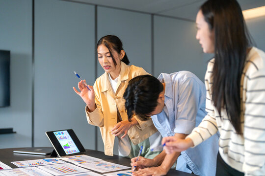 Asian young professionals meeting on laptop, inclusive teamwork business training, leadership development, marketing skills seminar, new gen workforce, cultural communication and digital learning