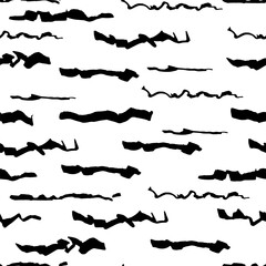Seamless abstract pattern with black brush strokes on white background. Japanese ink painting style. Design for printing on fabric, wallpaper, wrapping.