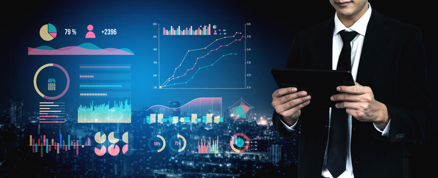 A businessman engages with data and financial charts on a tablet, surrounded by a dynamic urban skyline at night, showcasing modern analysis tools. Impute