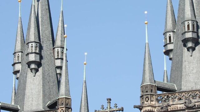 Upward Pan of Gothic Church Spires in Prague on Sunny Day